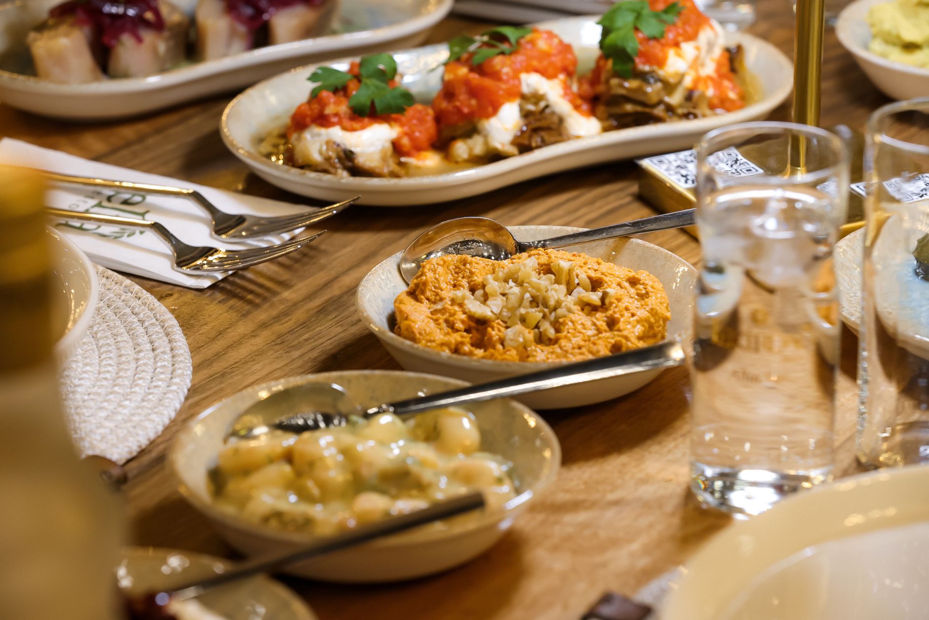 A family-style spread down a long table